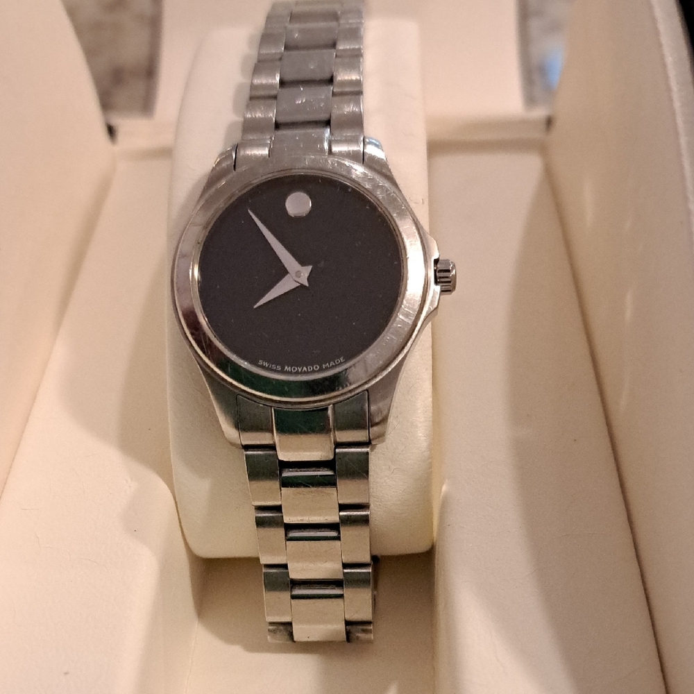 Movado Silver and Black Watch with Minimalist Design